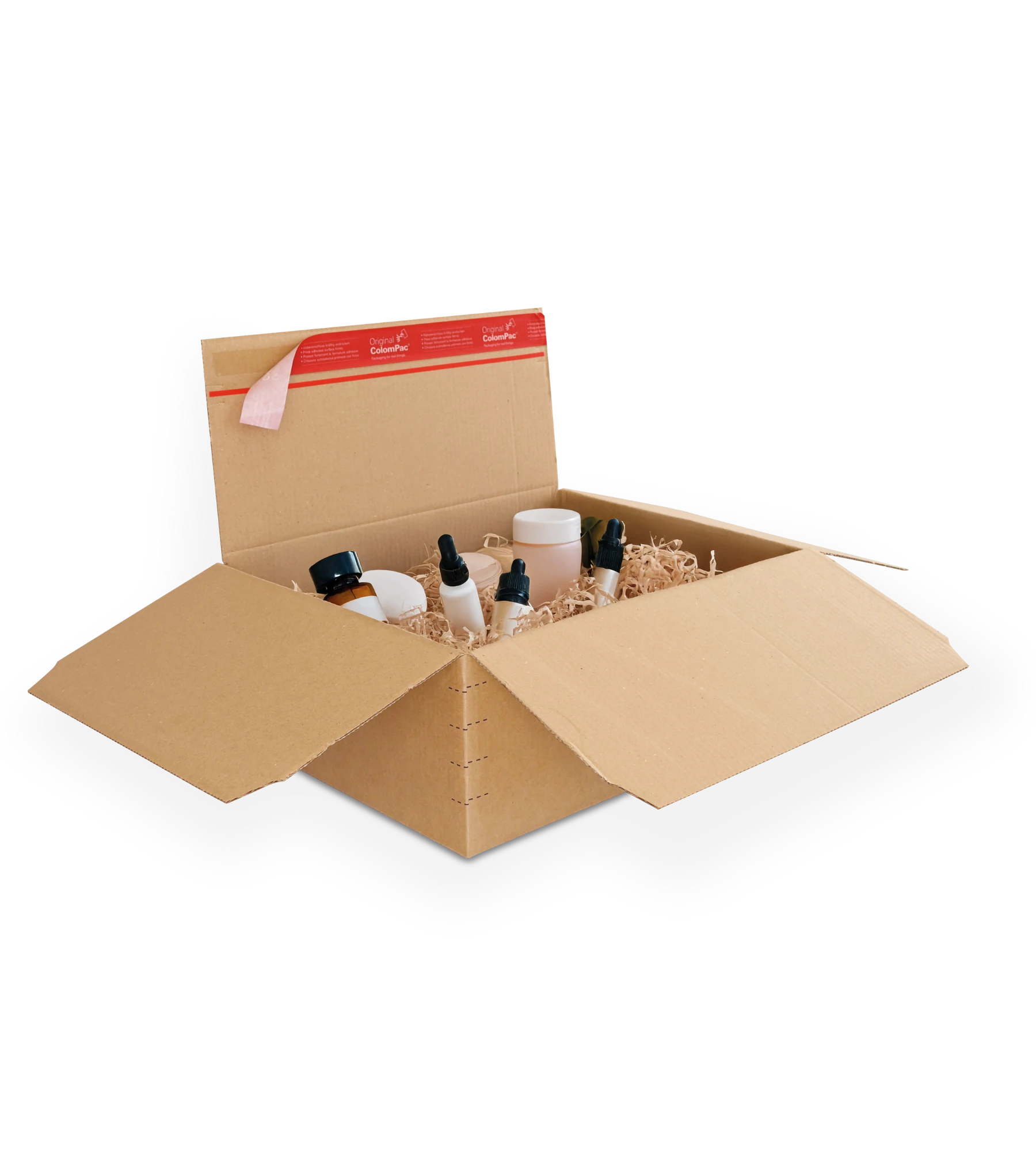 Geöffneter brauner Versandkarton aus Wellpappe mit mehreren kleinen Flaschen und Behältern. Oben am Karton befindet sich ein roter ColomPac-Selbstklebeverschluss.